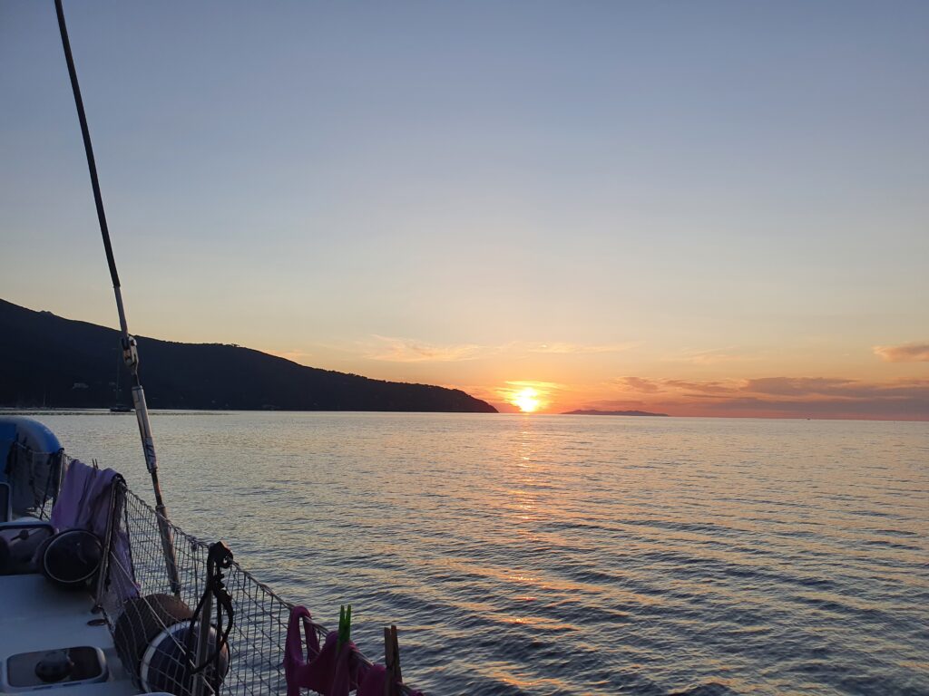 Sunset at Elba isle seen from Catamaran