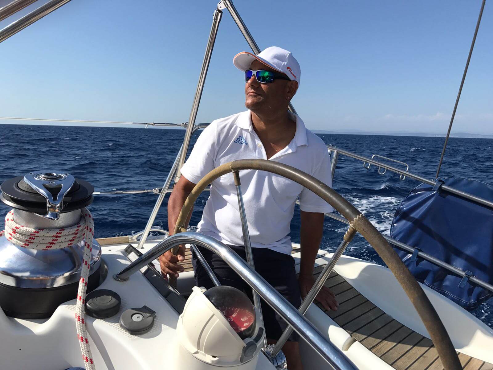 Cristian D'Arcangelo, professional catamaran skipper at the helm of MySailCruise.