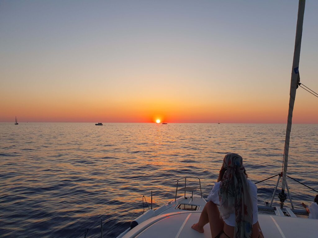 Spectacular sunset from Stromboli's Sciara del Fuoco. Volcanic eruptions and unforgettable cruise with MySailCruise skipper.