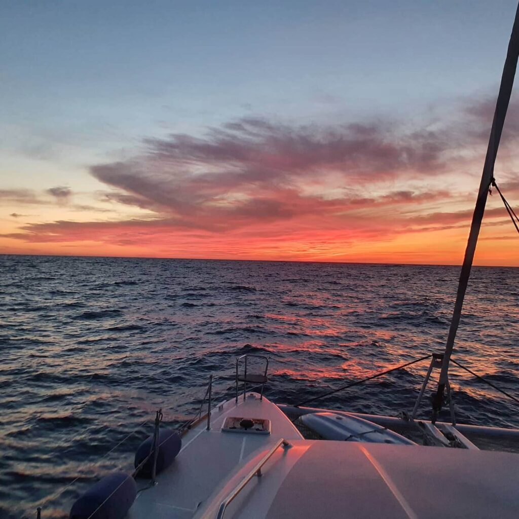 Spectacular sunset from Vulcano island, Aeolian Islands. Catamaran cruise with MySailCruise skipper.