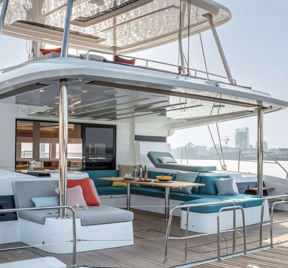 Lagoon 55 flybridge lounge with spacious outdoor seating – MySailCruise